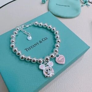 Tiffany & Co. Silver Bracelet with Pink Mouse Charm